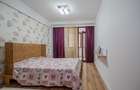 Apartament cu 3 camere decomandat în Tractorul - 24