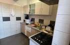 Apartament cu 2 camere decomandat în Popești-Leordeni - 18