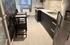 Apartament de inchiriat 3 camere, doua bai, bucatarie inchisa, 70 mp, utilat complet strada Tineretului 37i - 2