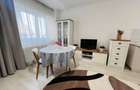 Apartament cu 3 camere decomandat în Tractorul - 2