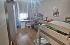 Apartament cu 4 camere decomandat în Tractorul - 15