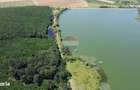 Teren 2404 mp la Lacul Murani langa padure concept Green and Blue