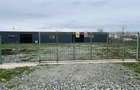 Teren intravilan de vanzare 2200m2cu hala metalica inchisa de 450m2