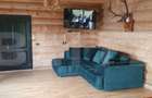Cabana din bustean masiv si o suprafata de teren de 9000 mp in Vatra Dornei