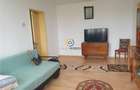 Apartament cu 3 camere semidecomandat în Calea București - 2