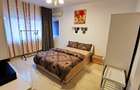 Apartament cu 3 camere decomandat în P-ța Romană - 9