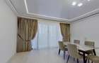 Apartament cu 4 camere decomandat în Tractorul - 1