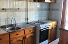 Apartament 3 camere la parter,90mp in vila cu 3 nivele, curte cu spatiu verde si pomi.