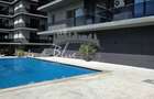 Apartament modern cu balcon generos si acces la piscina - 9