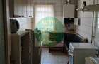 Apartament cu 4 camere decomandat în Roman - 3
