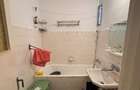 Apartament cu 4 camere decomandat în Roman - 4