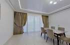 Apartament cu 4 camere decomandat în Tractorul - 1
