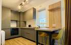 Apartament cu 2 camere decomandat în Tractorul - 4