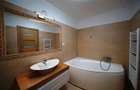 Apartament cu 4 camere decomandat în Tractorul - 22