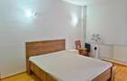 DE INCHIRIAT 2 CAMERE ETAJUL 1 - 12
