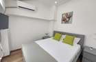 Apartament cu 2 camere decomandat în P-ța Universității - 11