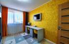 Apartament cu 4 camere decomandat în Tractorul - 35