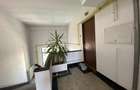 Apartament cu 4 camere decomandat în Capitale - 11