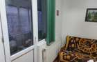 Apartament cu 4 camere decomandat în Roman - 1
