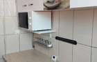 inchiriez apartament doua camere la curte - 3