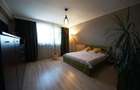 Apartament cu 4 camere decomandat în Tractorul - 10