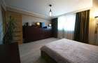 Apartament cu 4 camere decomandat în Tractorul - 12