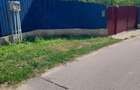 Vand pamant la strada 1300 mp in judetul Valcea comuna Stoenesti Dobriceni cu curent electric cu apa in curte 3 pompe si solar de 100 de mp livada - 1