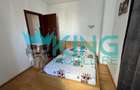 Apartament cu 4 camere decomandat în Titan - 14