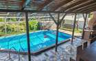 CASA/CURTE/PISCINA/GARAJ/STR. UNIRII/LANGA MANASTIREA CURTEA DE ARGES