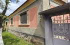 Casa 2 camere, baie, bucatrie - casa se vinde cu anexe gospodaresti si teren de 5000 mp, livada prun - 5