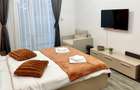 Apartament cu 2 camere decomandat în Poiana Brașov - 9