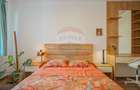 Apartament cu 4 camere decomandat în Tractorul - 11