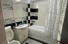 Apartament modern 2 camere, AC, terasa + 2 locuri de parcare subterana complet mobilat si utilat disponibil imediat