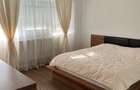 Apartament cu 2 camere decomandat în P-ța Romană - 11
