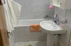 Apartament cu 4 camere decomandat în Titan - 9