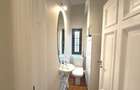 Apartament cu 4 camere semidecomandat în Capitale - 14