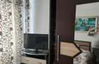 Apartament cu 4 camere decomandat în Roman - 8