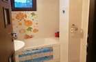 Apartament cu 3 camere decomandat în Central - 7 Apartament cu 3 camere decomandat în Central - 7