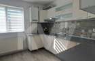 Apartament modern cu 2 camere, curte privată și 2 locuri de parcare