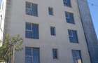 Vand bloc locuin?e colective la ro?u, stradal ?os. Chitilei- 930000E - 9