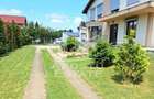 Casa individuala cu 6 camere,3 bai, garaj, teren 1362 mp - 1
