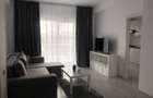 Inchiriez apartament 2 camere + parcare. Bloc nou. Sector 4 - 1
