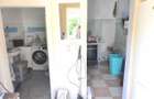Cladire cu 2 apartamente, un spatiu comercial si anexe - Semicentral - 2