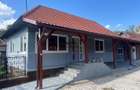 Casa renovata cu teren si anexe in Birtin