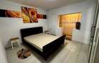 Se ofera spre inchiriere un apartament spa?ios, luminos ?i complet mobilat ?i utilat, situat intr-o - 2