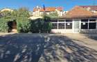 Se ofera spre inchiriere spa?iu comercial situat in Gherla, 90 mp util + curte 120 mp - 2