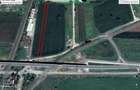 Teren 5.000 mp pt. diverse activitati cu acces din sosea strada Ovidiu in fata l - 1