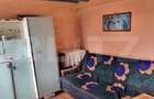 Casa cu doua corpuri,curte si gradina