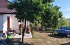 PF-Casa renovata,3 camere,baie,curte 860mp,pe soseaua ClujNapoca-Zalau