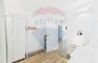 Apartament la parter ce are curte proprie , 2 camere in Bloc nou - 3